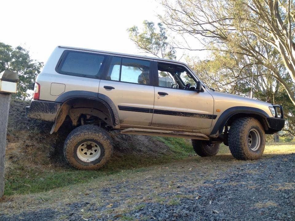 A Silver Suv is Parked on a Gravel Road — Mr Shiny Mechanical in Marian, QLD