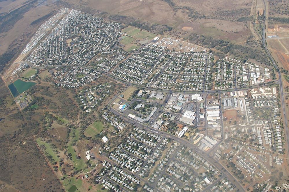 An Aerial View of a Residential Area With Lots of Houses — Mr Shiny Mechanical in Moranbah, QLD