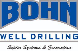 The logo for bohn well drilling septic systems and excavation.