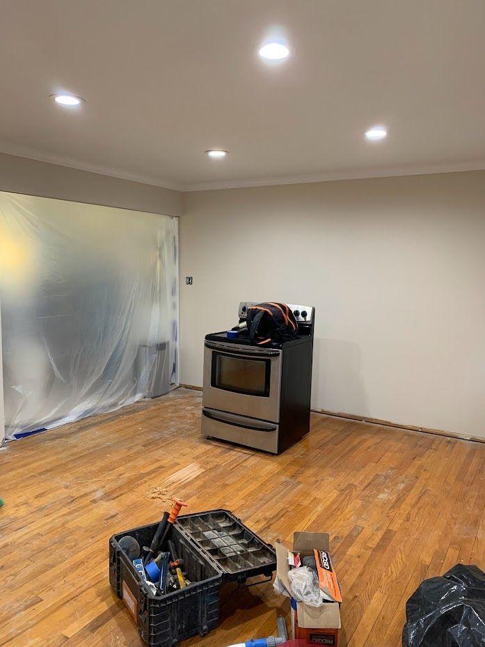 There is a stove in the middle of the room.