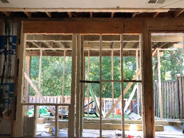 A house is being built with a sliding glass door.