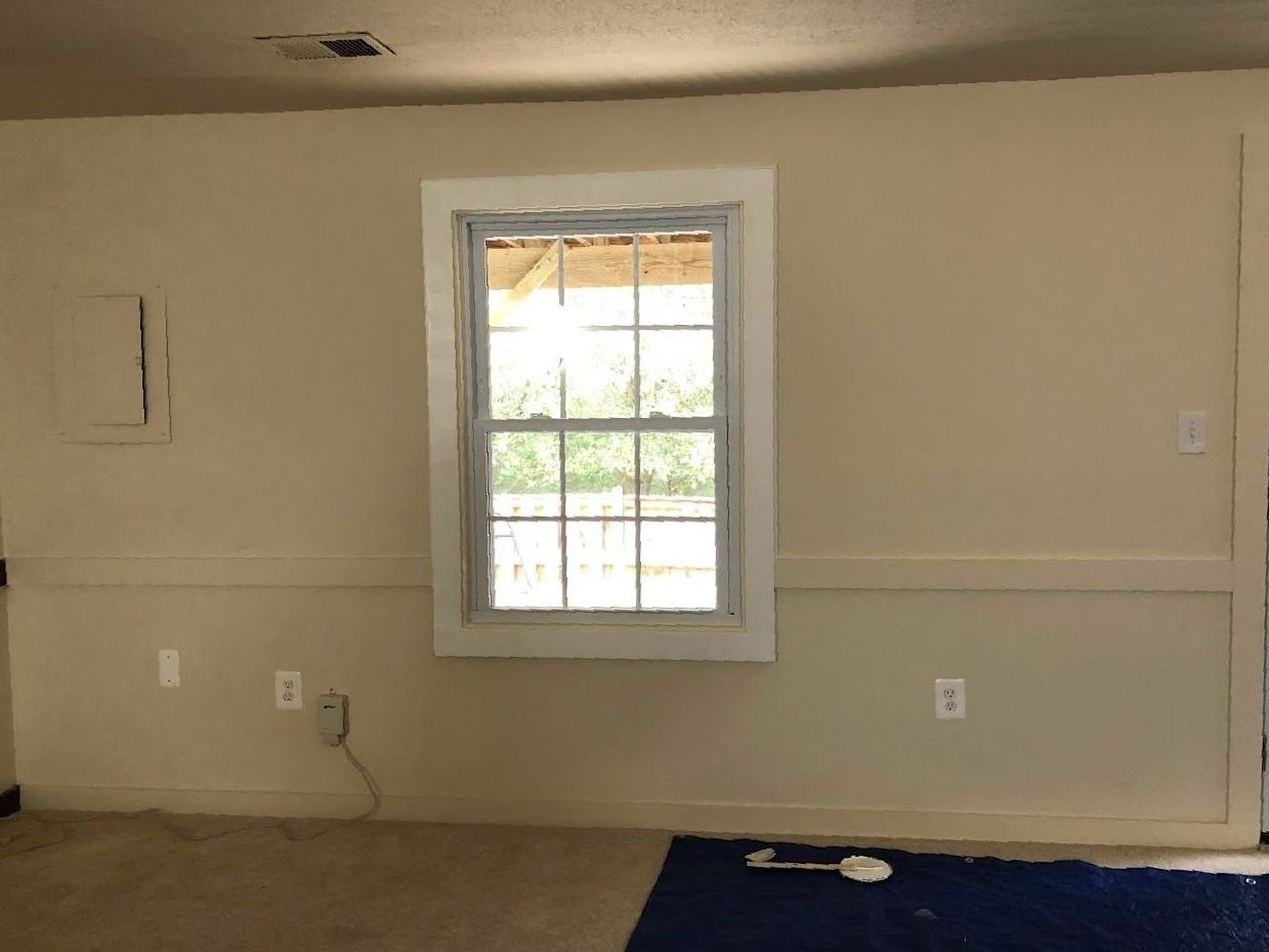 There is a window in the middle of the room.