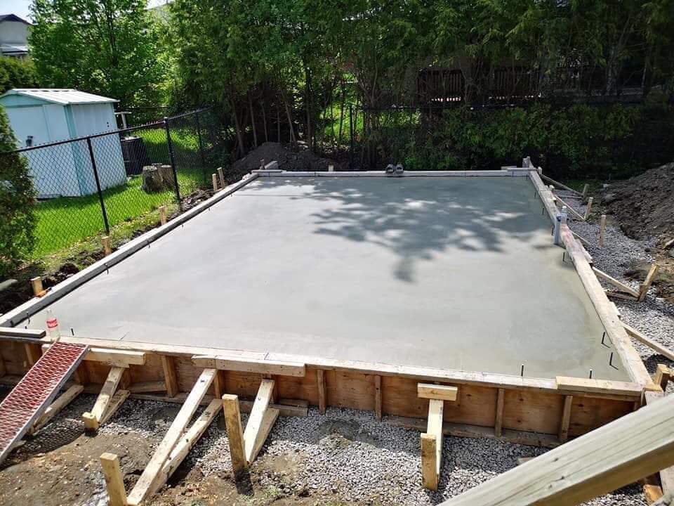 concrete foundation slab in backyard