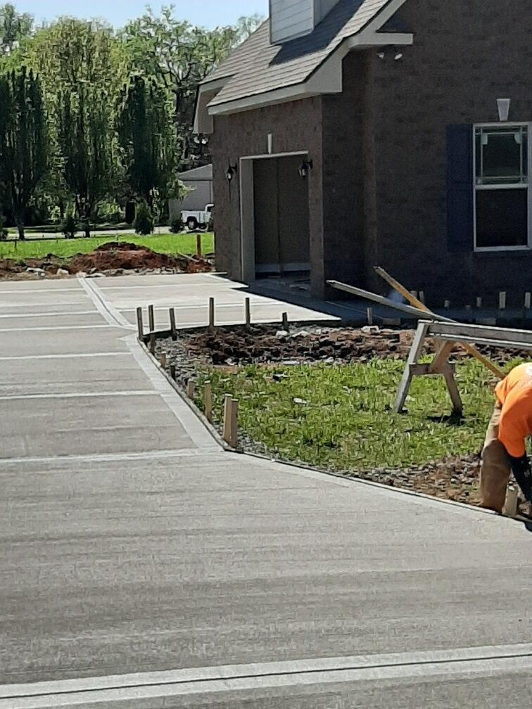 concrete driveway and walkway being constructed