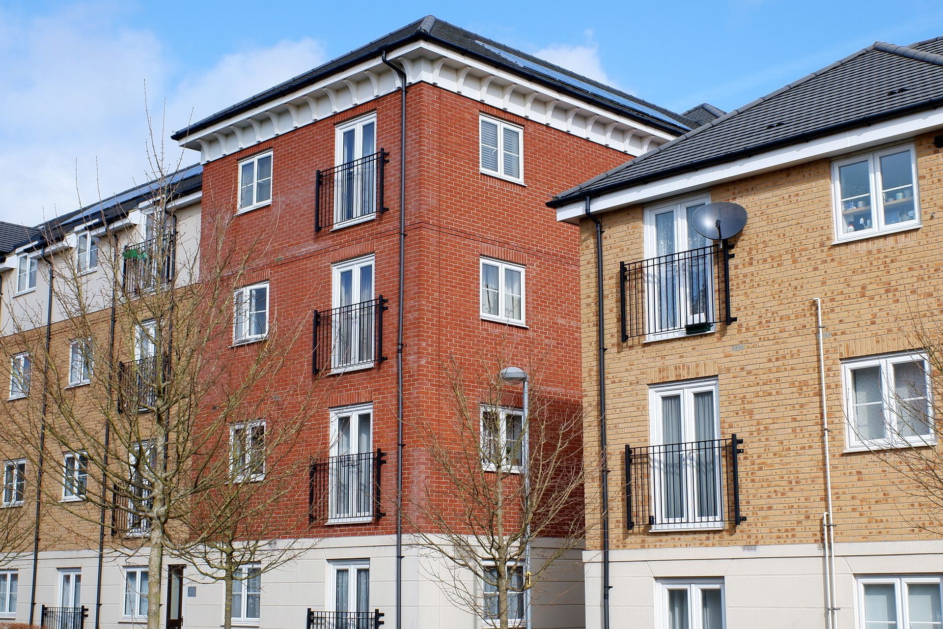 blocks of modern flats that belong to local authorities and housing associations.