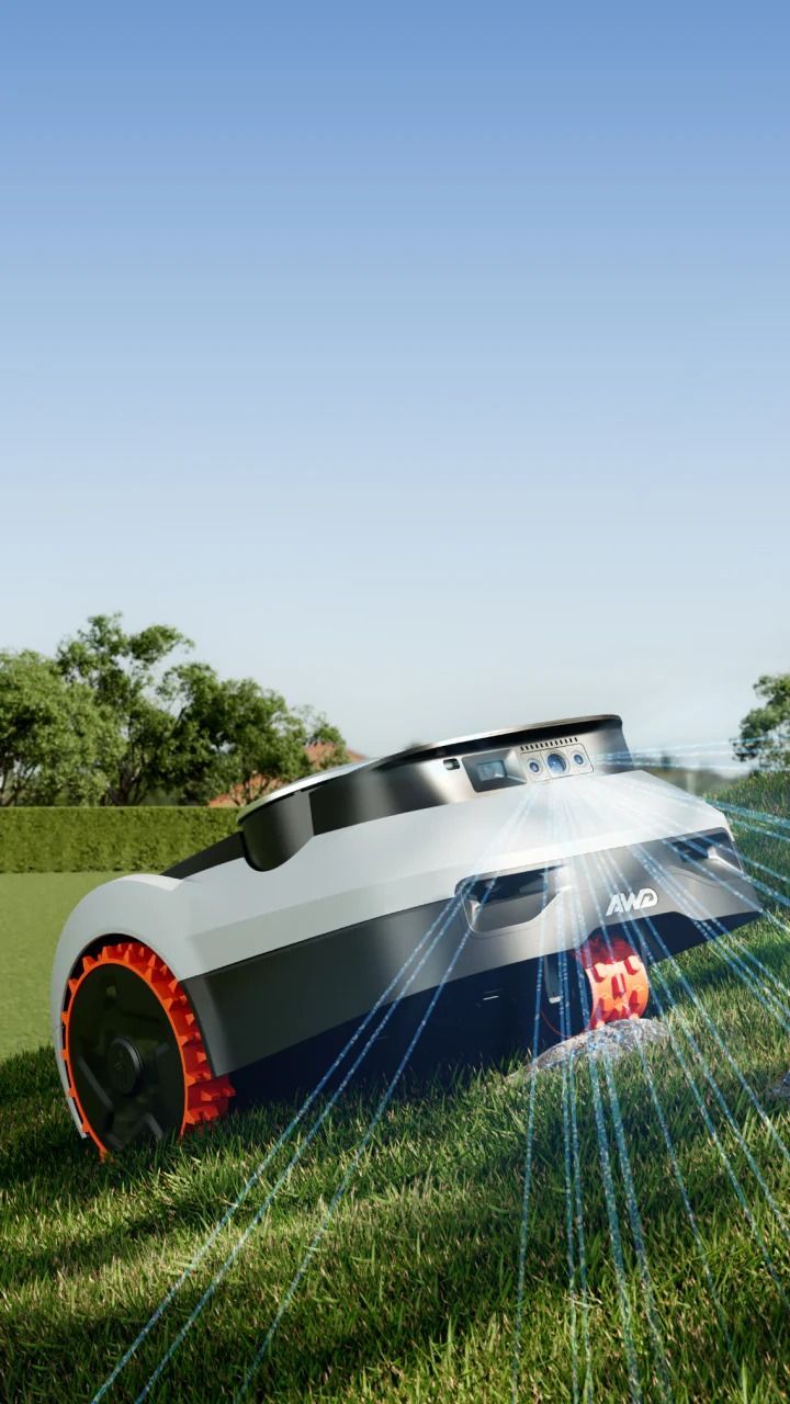 Un'auto futuristica bianca con ruote rosse sfreccia su un campo erboso sotto un cielo azzurro.