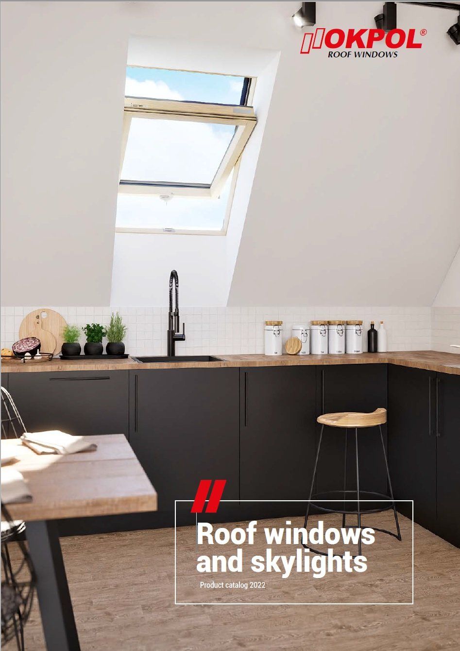 Kitchen with black cabinets, skylight, and text: 