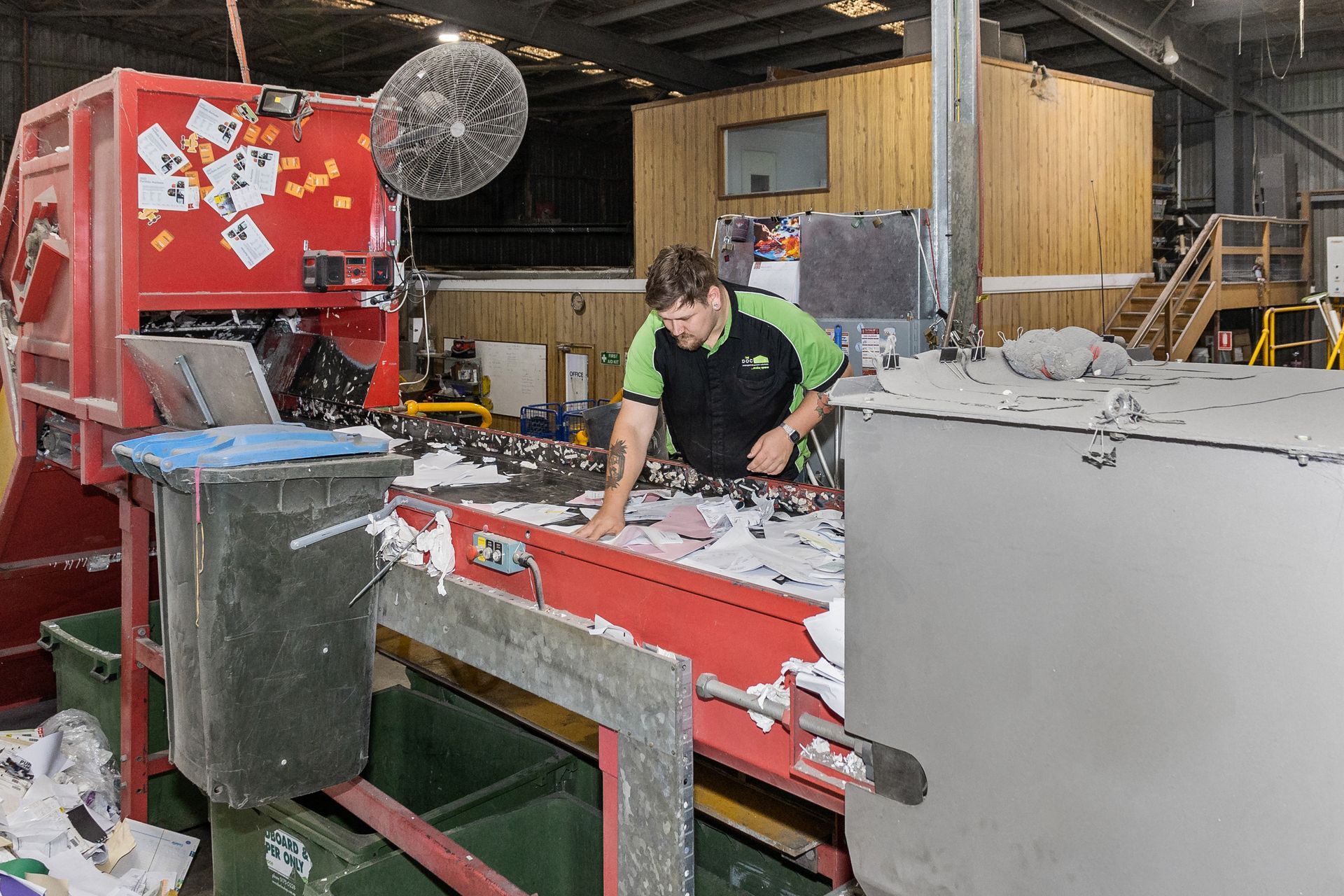 The DocShop team member securely processing bulk archive destruction and confidential recycling.