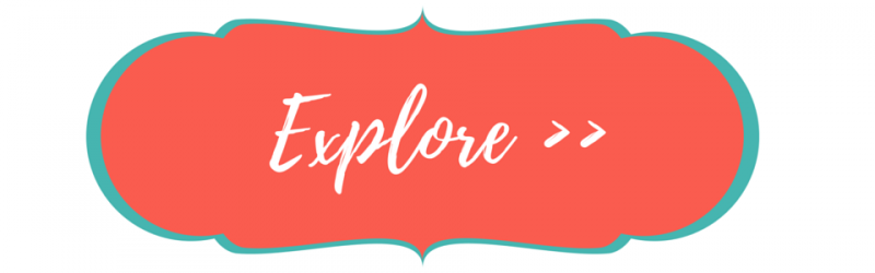 Coral rounded button with teal outline and white script text “Explore >>”