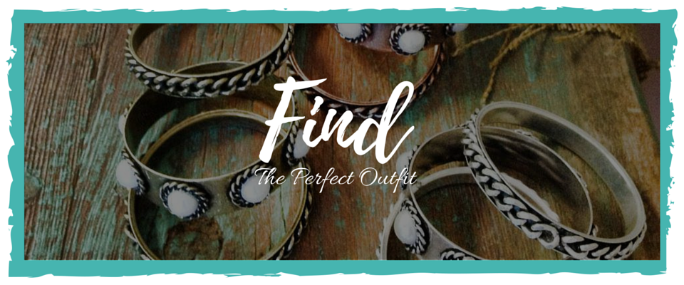 Silver rings on a rustic wood background with the word “Find” in white script