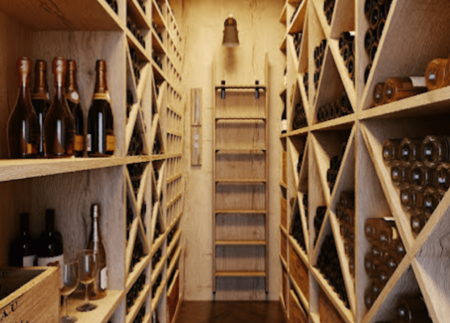 Une cave à vin remplie de nombreuses bouteilles et verres de vin.