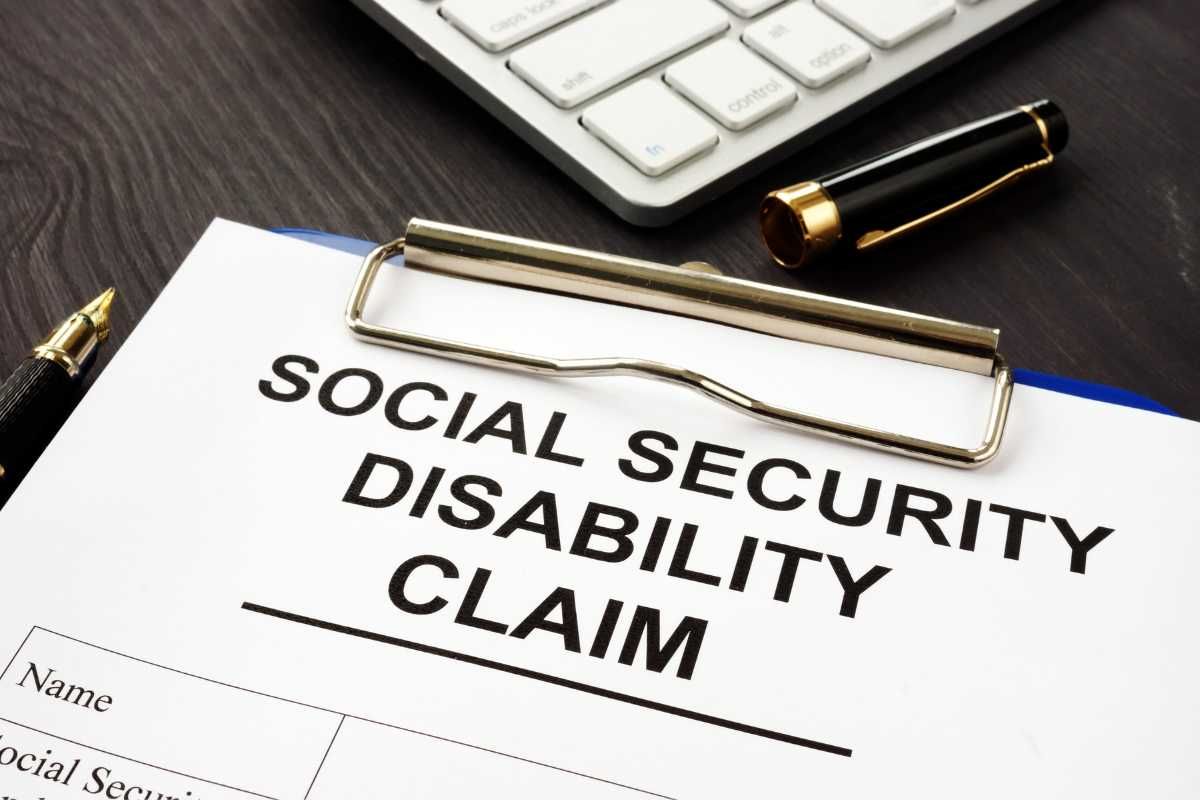 Closeup of a clipboard with a form that reads: Social Security Disability Claim 