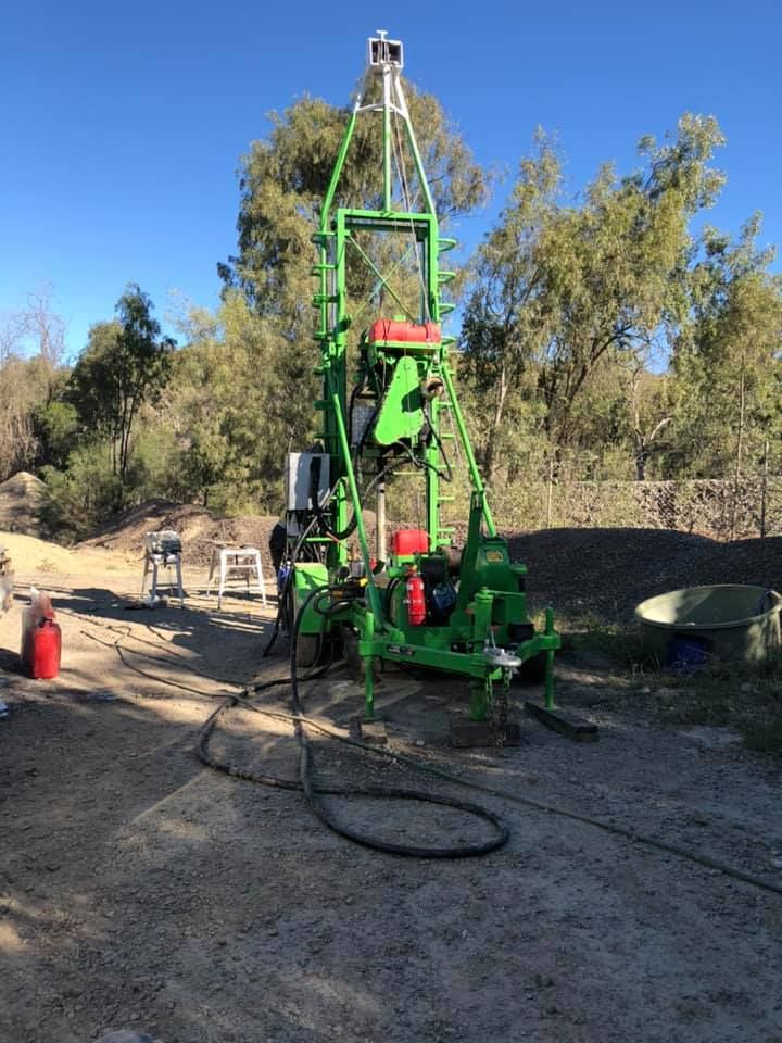 A Green Machine Is Sitting On Top Of A Dirt Field — PGI North QLD In Rosslea, QLD