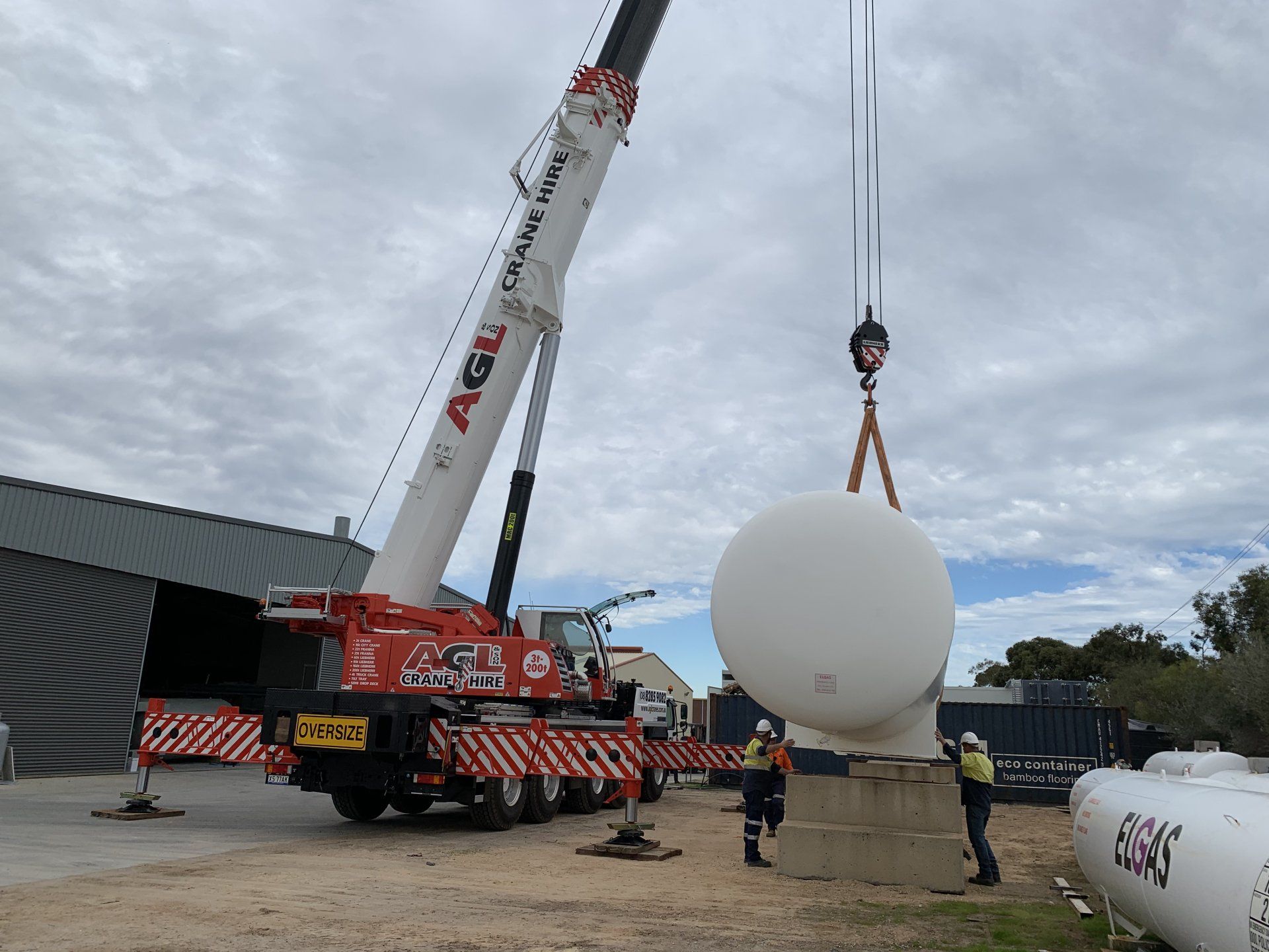 Workers Moving Gas Cylinder — Adelaide, SA — AGL & Son Crane Hire