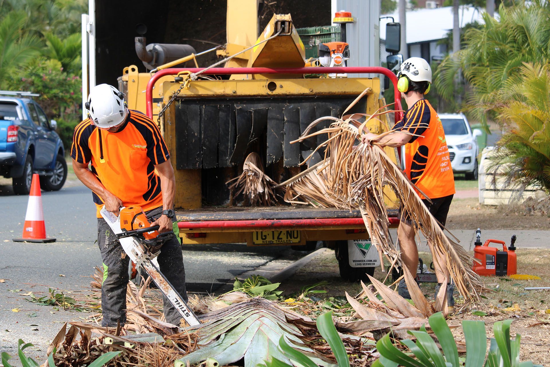 HiLine Trees staff doing some chipping and mulching