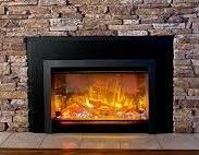 A fireplace in a living room with a brick wall.