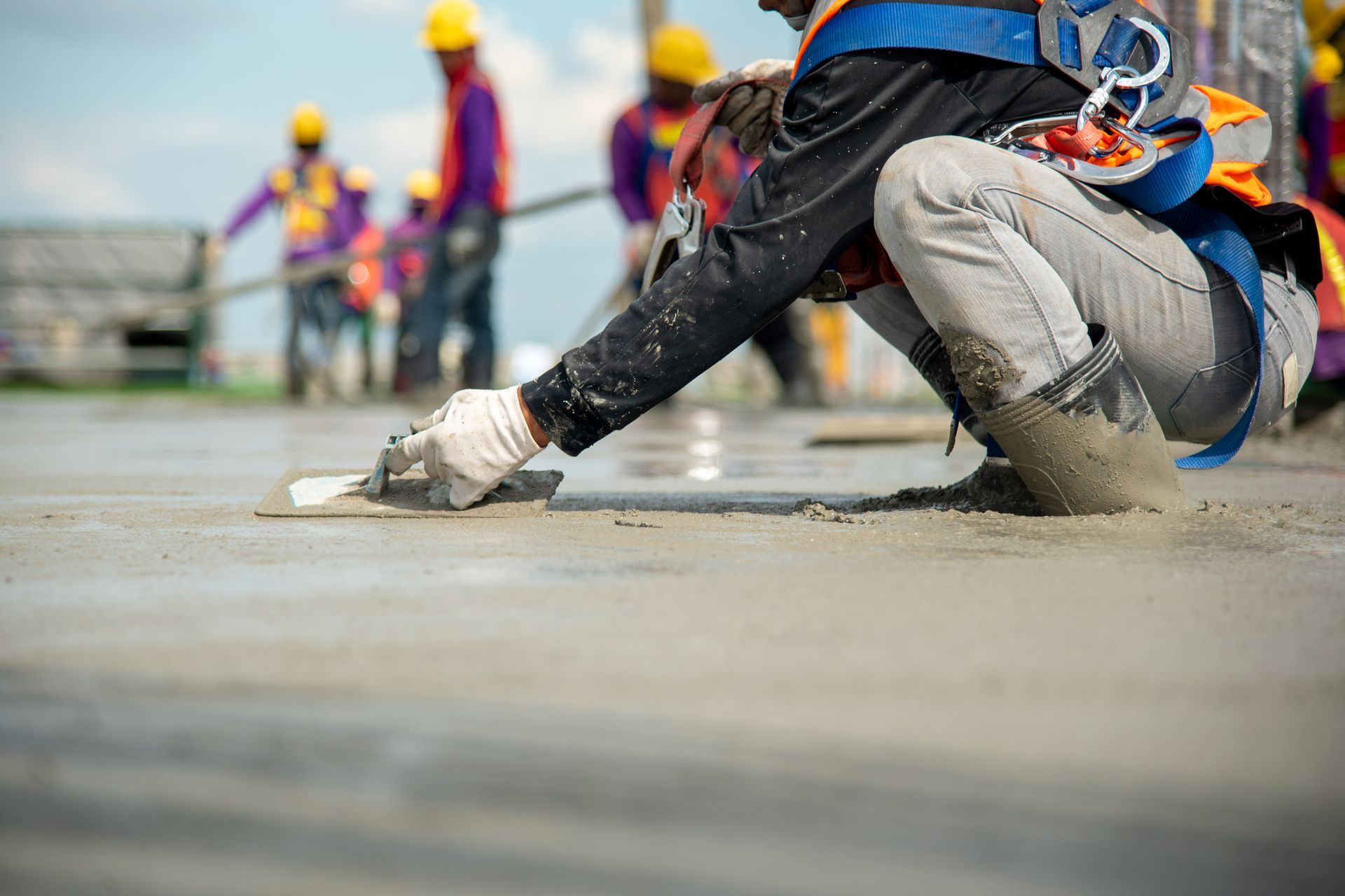 A construction worker from North American Paving providing concrete services in Fort Worth, TX.
