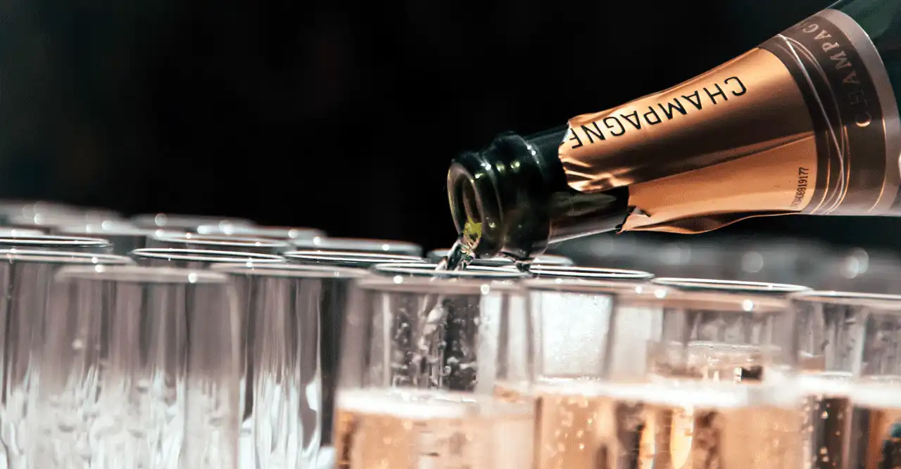 Celebrating the sale of the business Champagne celebration