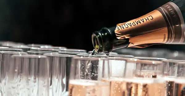 Celebrating the sale of the business Champagne celebration