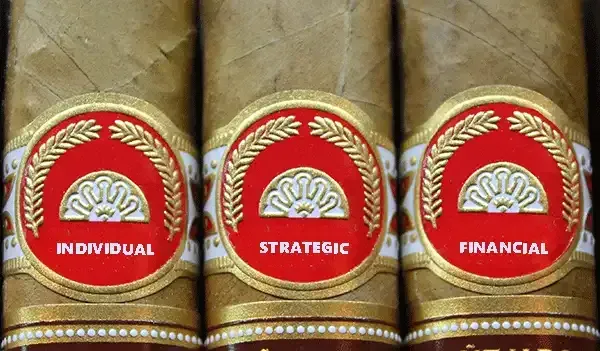Three cigars with red labels that say individual strategic and financial