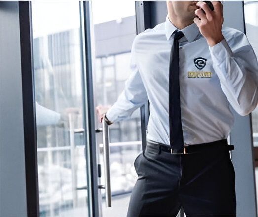 A man wearing a shirt that says security on it