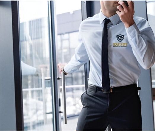 A man wearing a shirt that says security on it