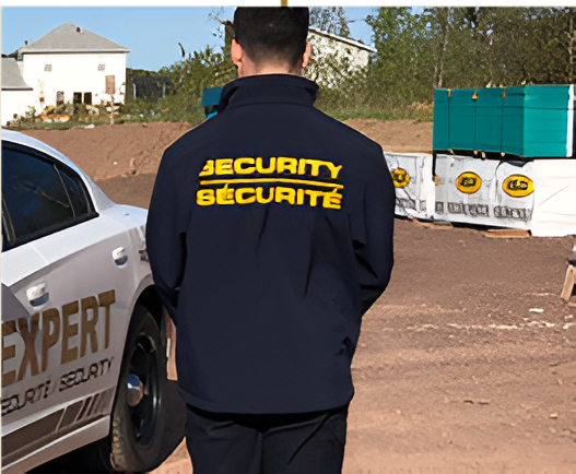 A man wearing a jacket that says security securite