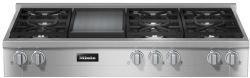 A stainless steel double oven with a microwave inside of it.