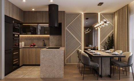 A kitchen and dining room in a house with a table and chairs.