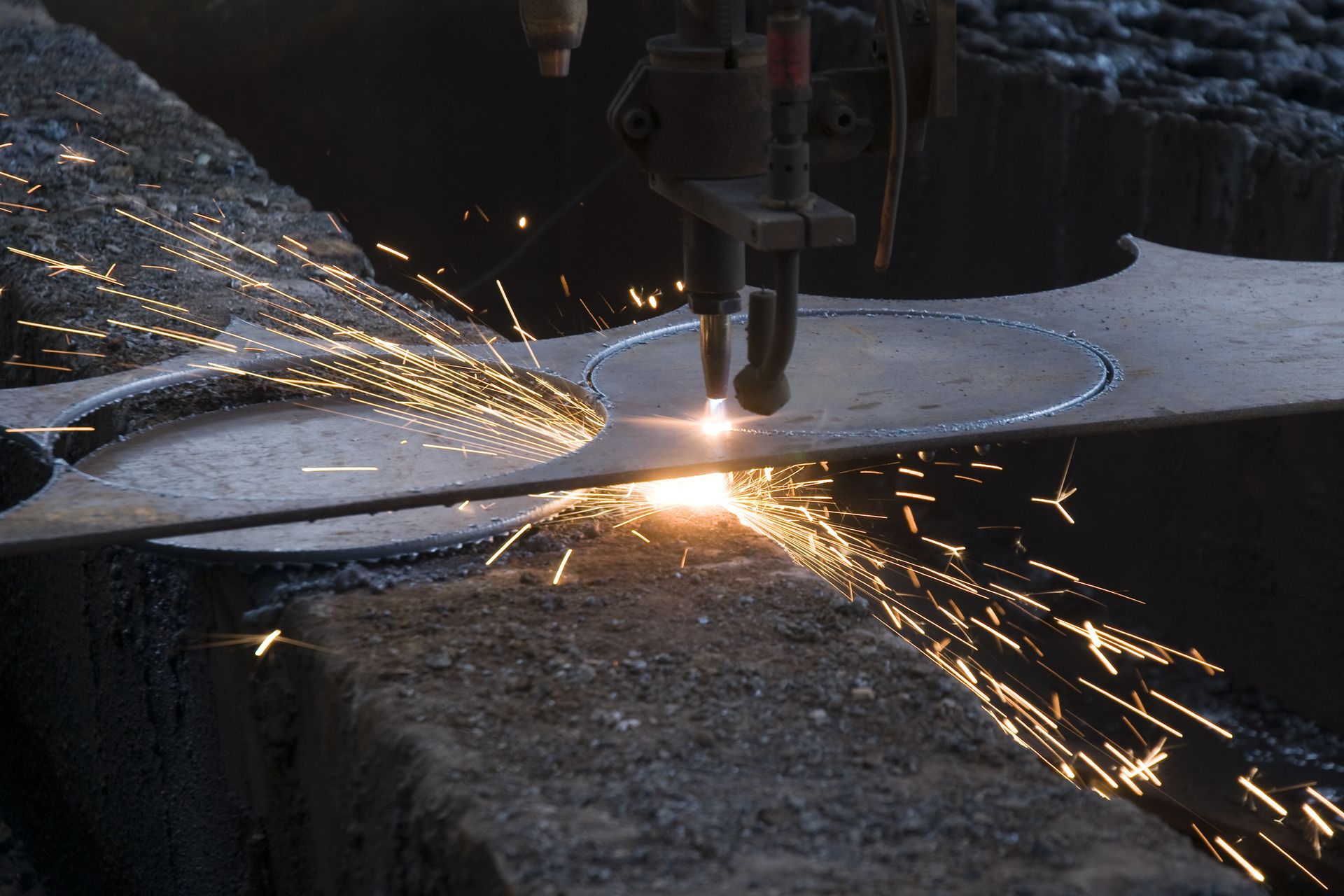 Metal Sheet Being Cut With a Torch — Bryants Laser Works in Logan, QLD