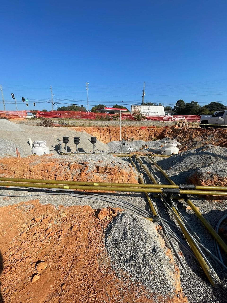Commercial building under construction with steel framing and boom lift in Woodstock Georgia