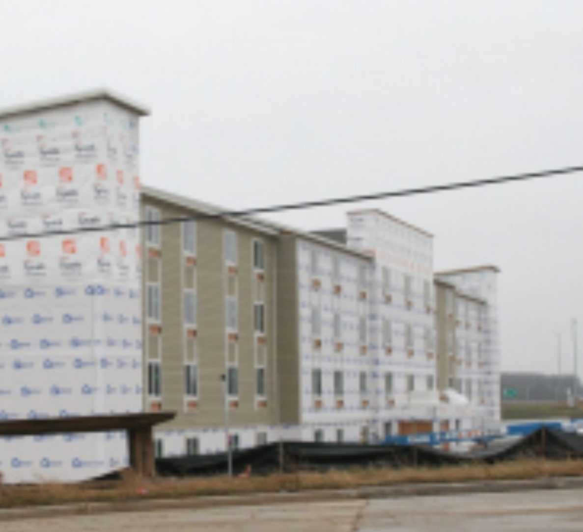 Hotel and apartment construction project under one coordinated schedule by Art Design and Constructi