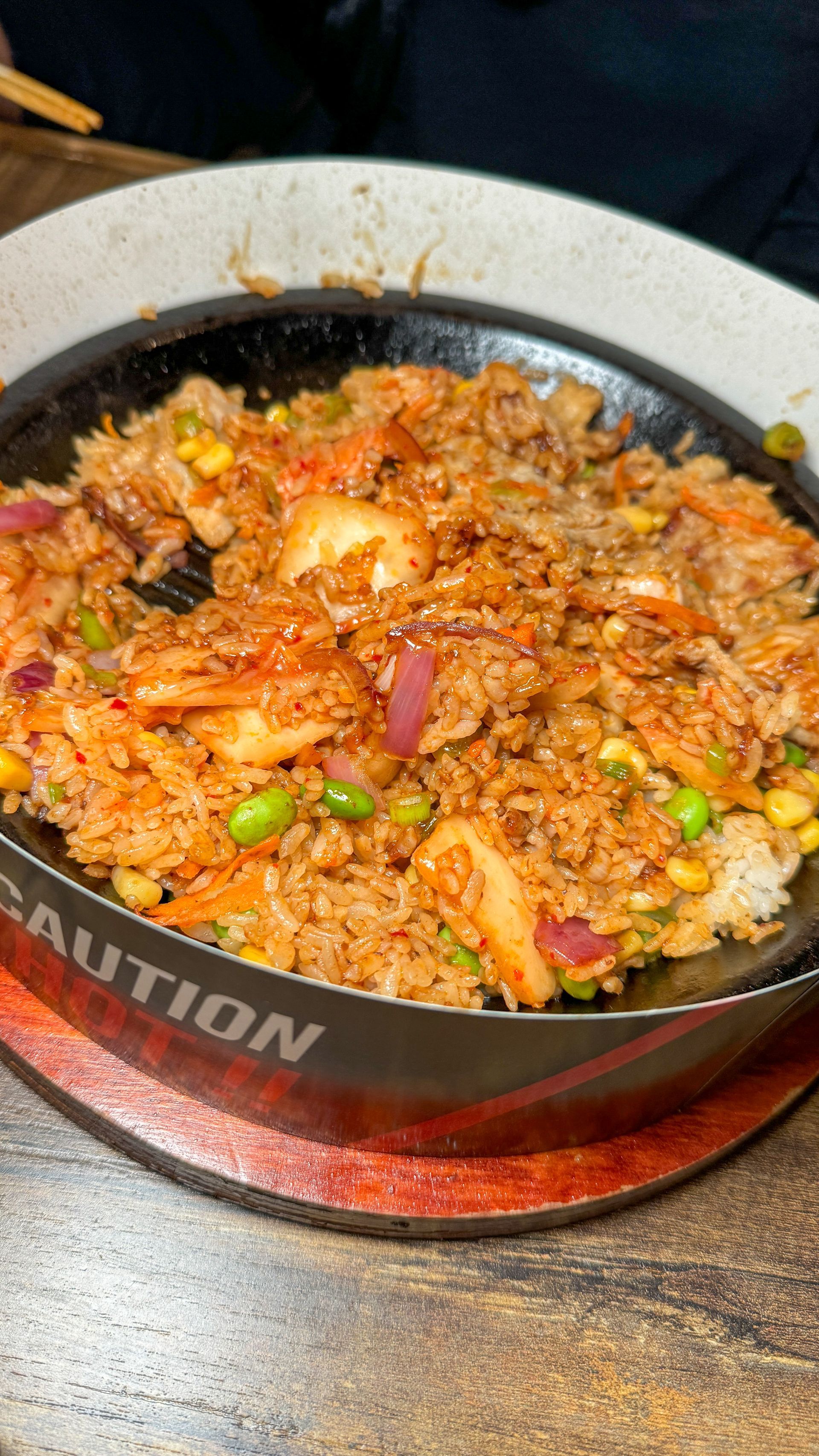 A close up of a bowl of food on a table.