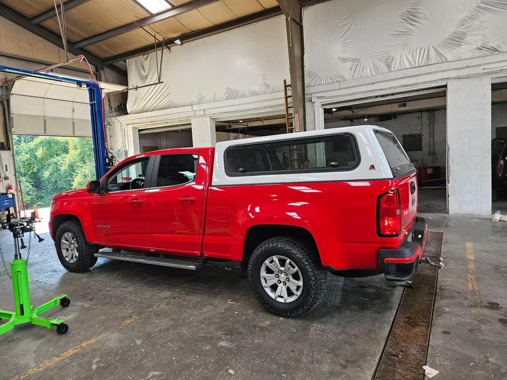 Red pick-up truck | CAL Automotive