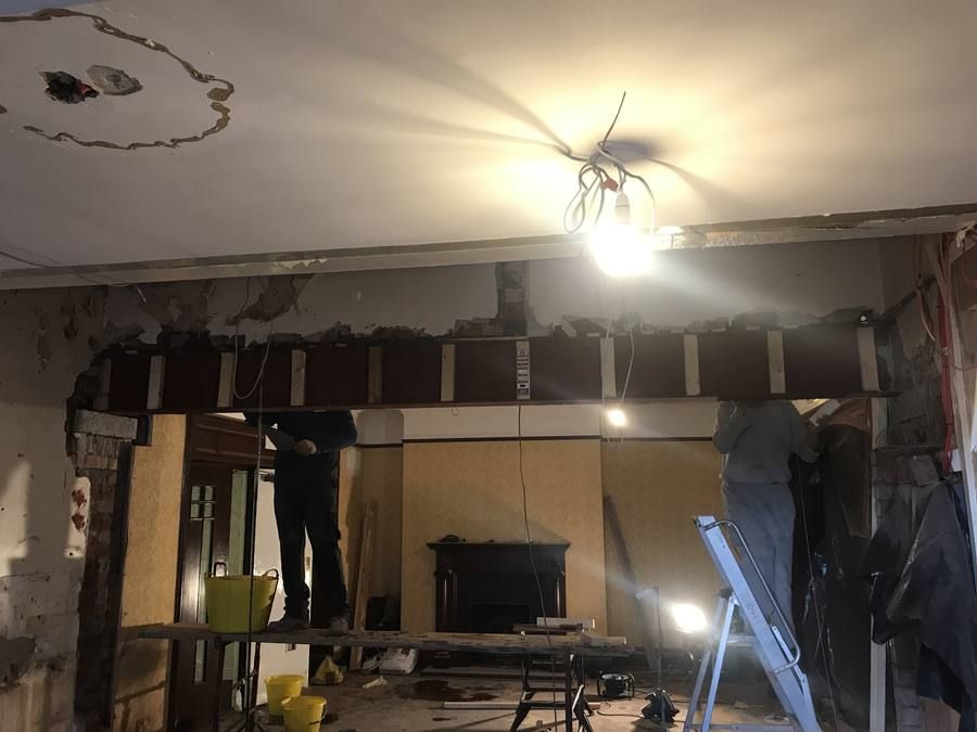 Steel beam installed during commercial knock through