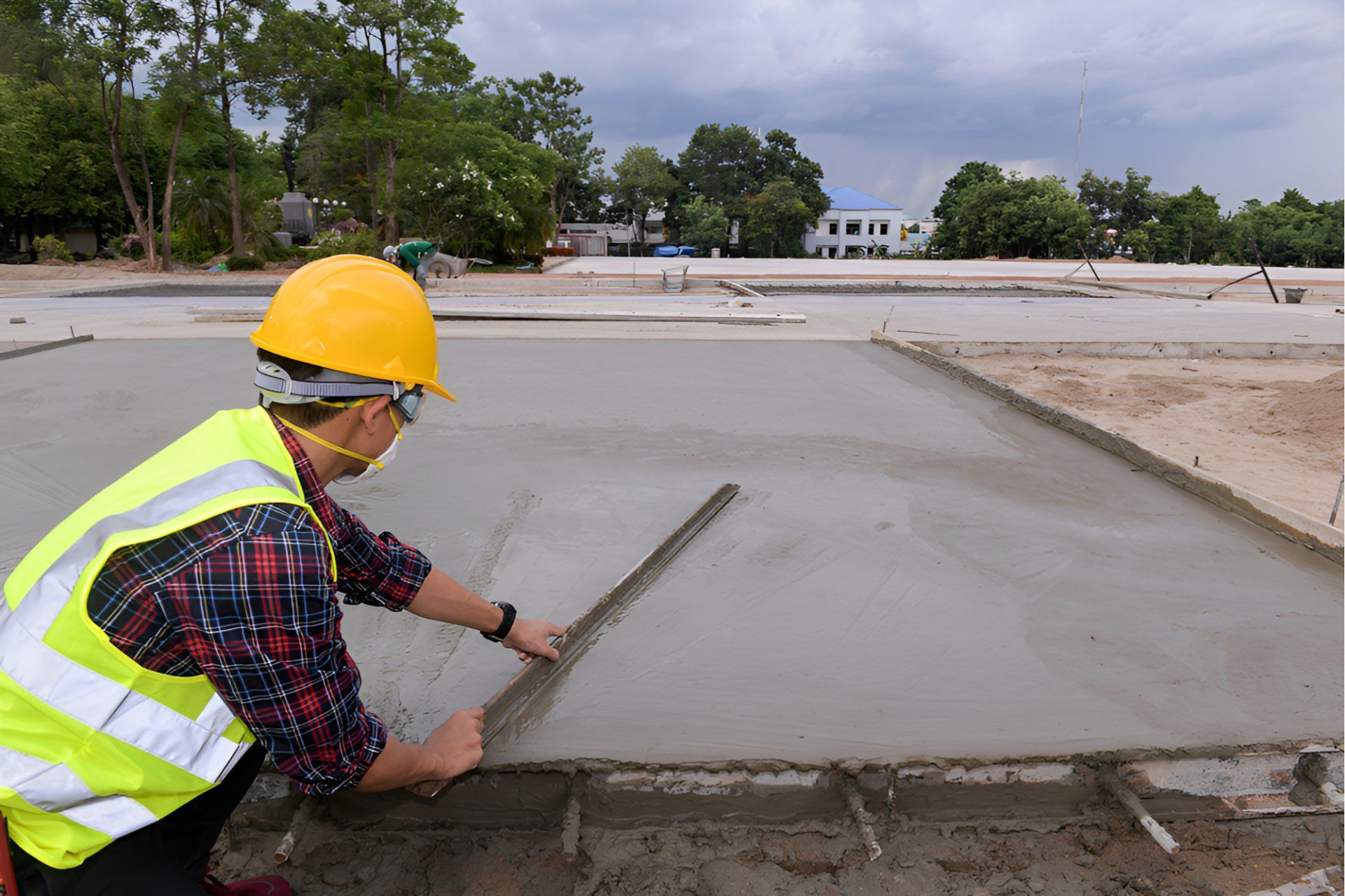 Person in Yellow Hard Hat and Vest — Frontier Cement Supplies In East Arm, NT