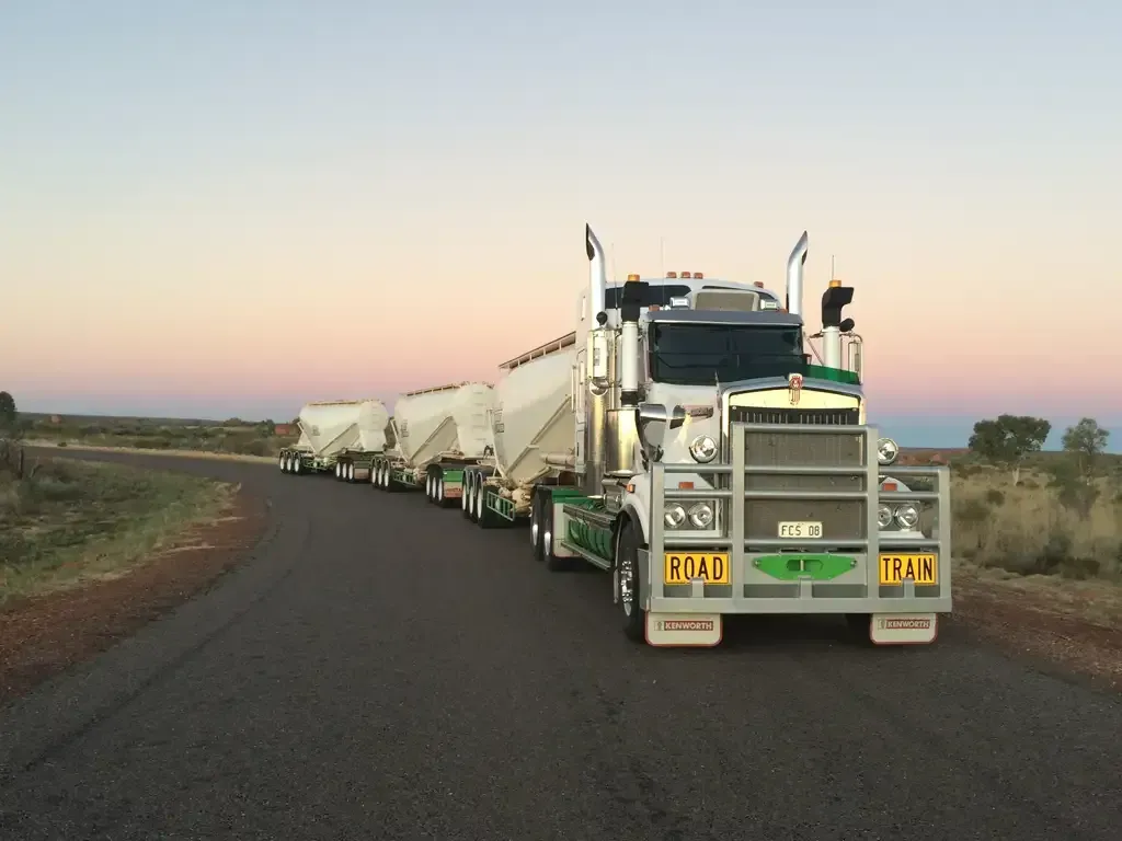 A Person Is Pouring Concrete Into A Concrete Floor — Frontier Cement Supplies In East Arm, NT