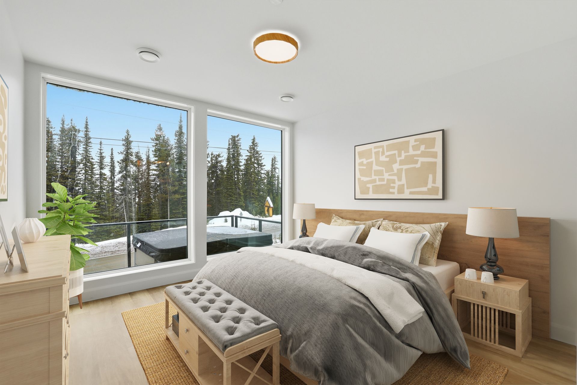 Bright bedroom with a bed, large windows, snowy trees outside, and a cozy bench at the foot of the bed