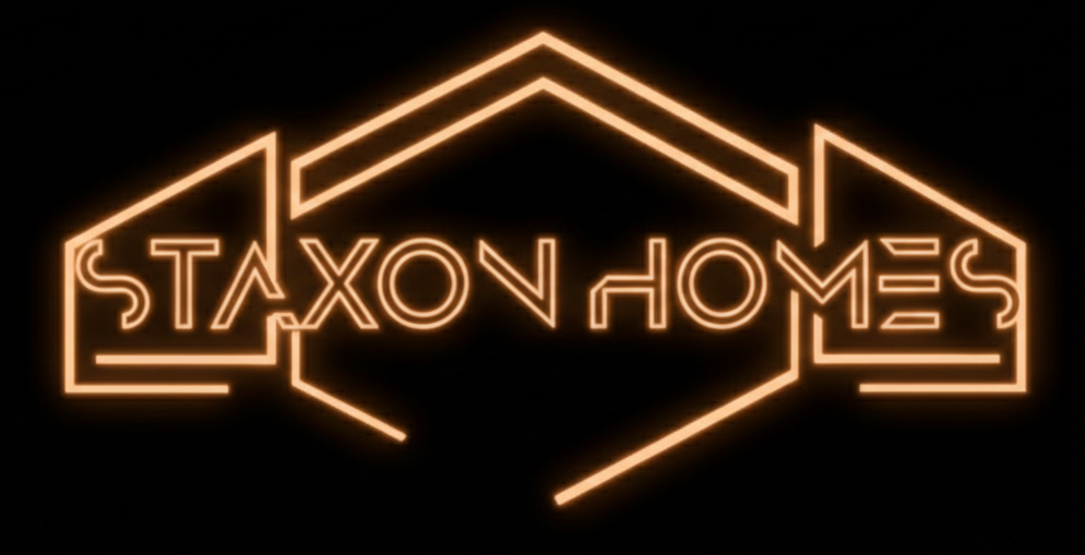 Neon orange “STAXON HOMES” logo outlined like a house on a black background
