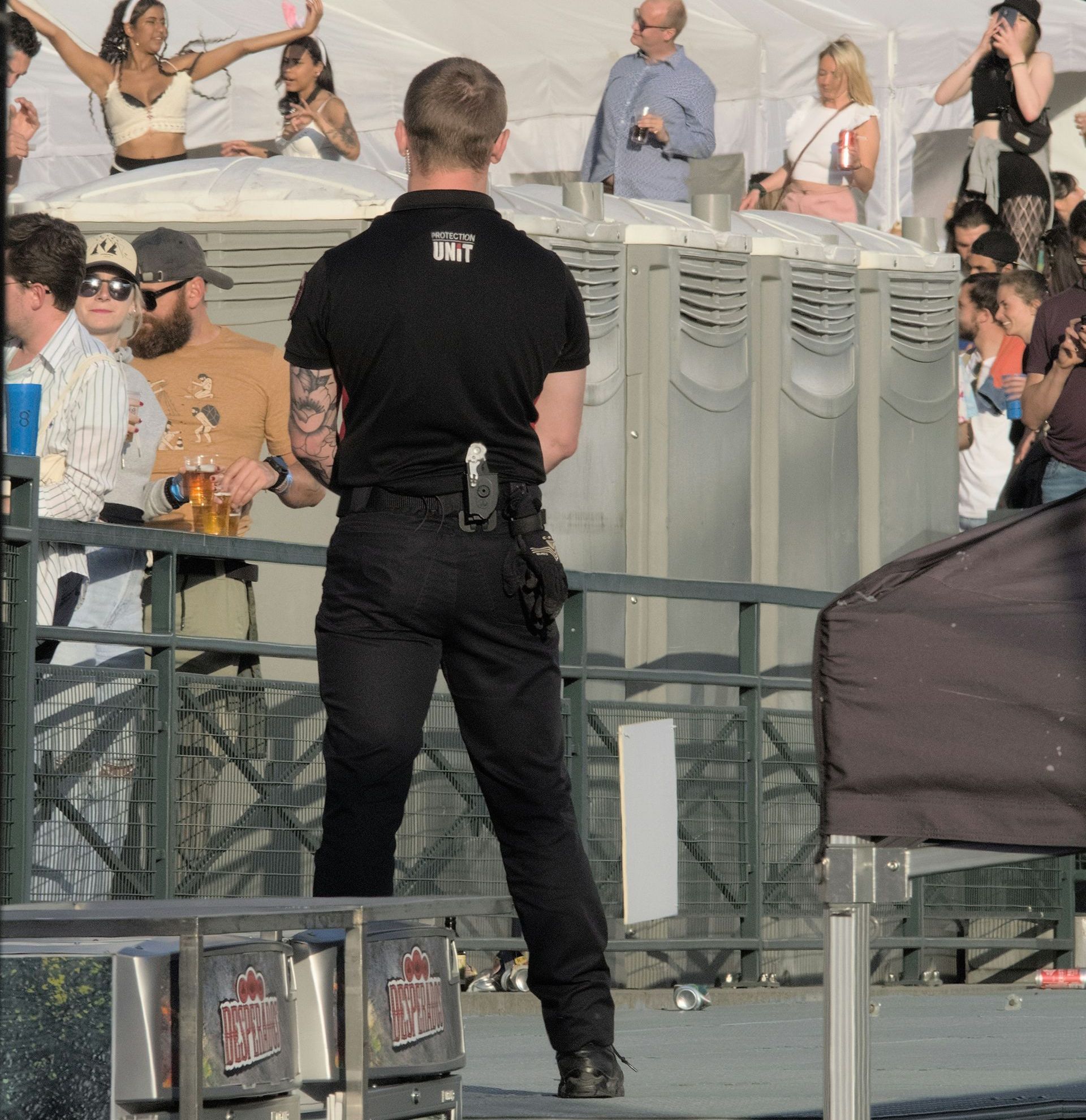 A man in a black shirt with the word ny on the back