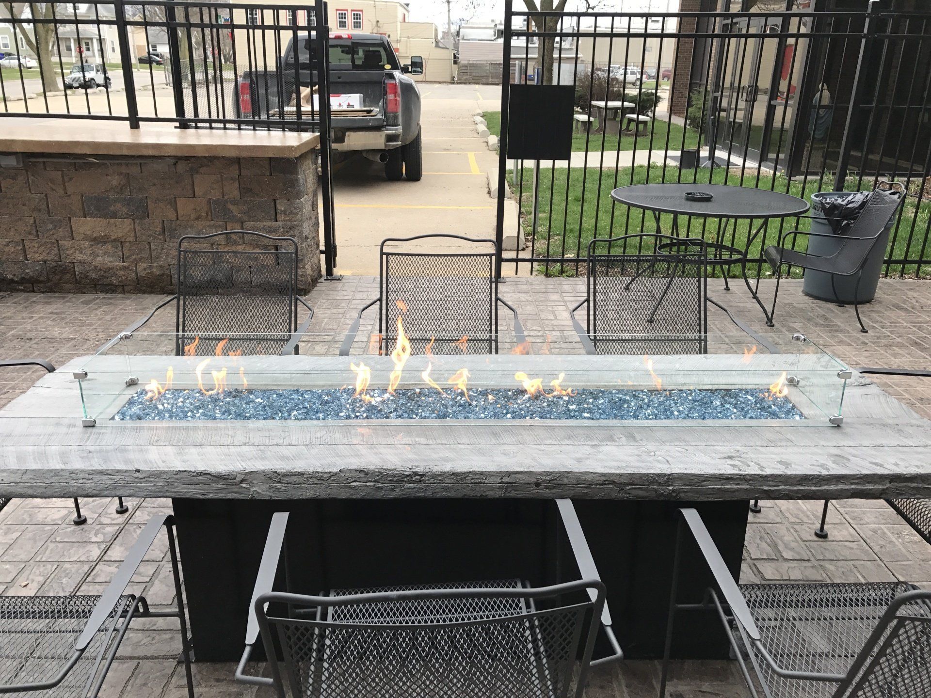 Table with fireplace — Cedar Rapids, IA — Earthworks Concrete