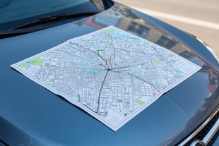 Printed route map on a car hood