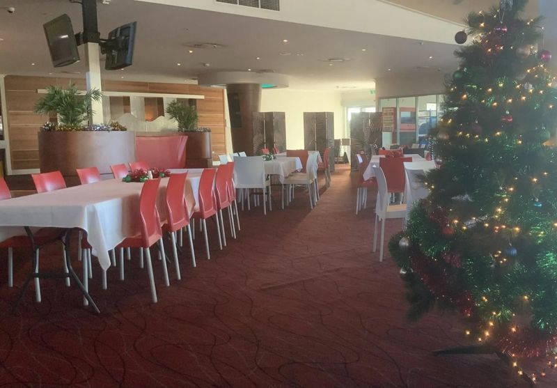 Dining Room With Tables Set for a Meal — Capricorn Tavern in Taranganba, QLD