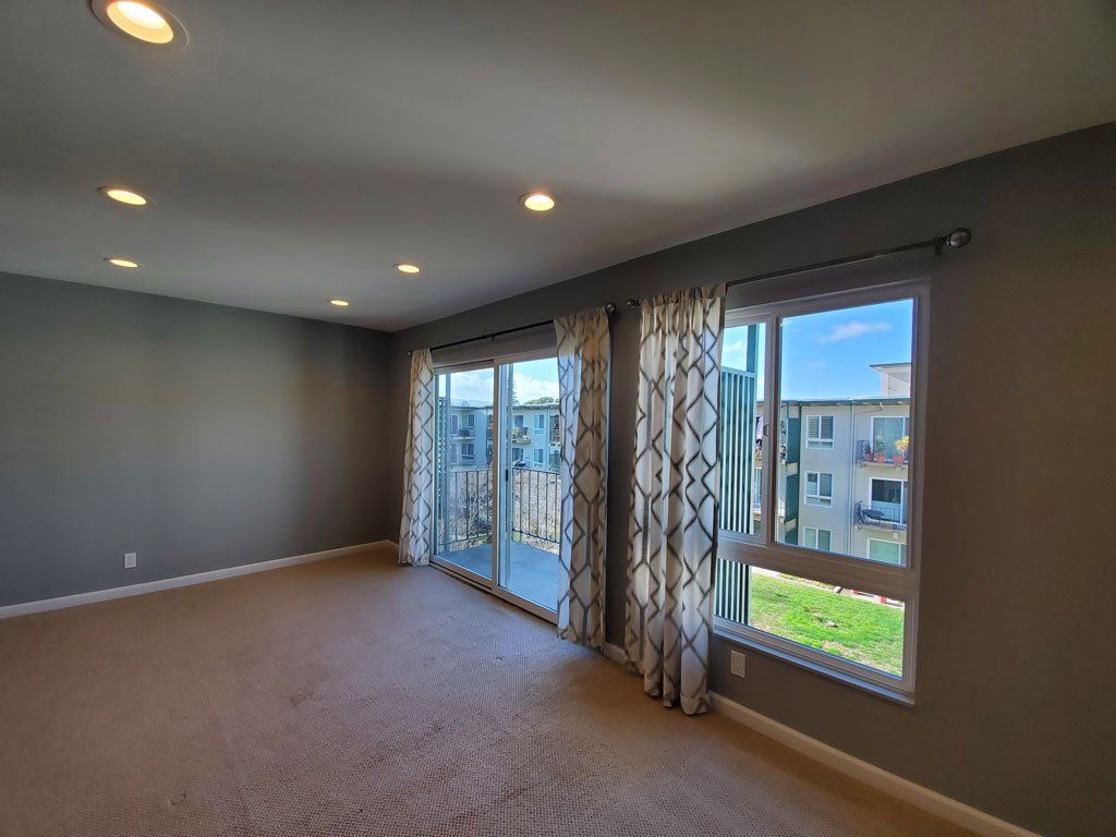930 Peninsula San Mateo, Studio apartment, living area looking out to balcony