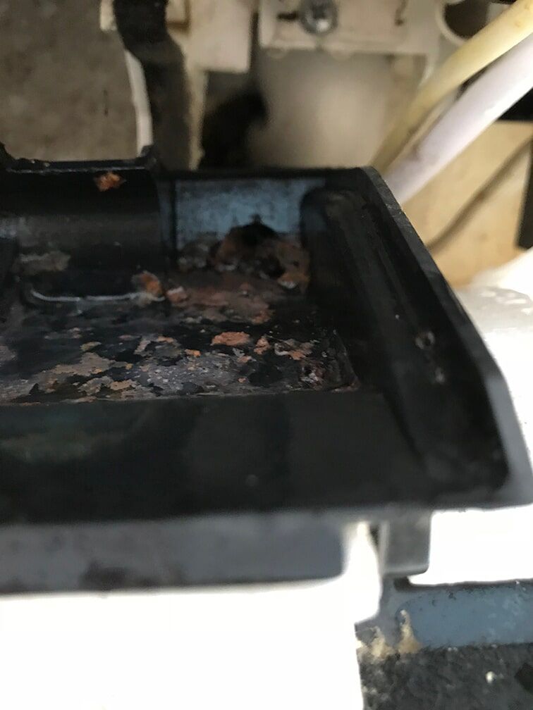 Blocked drain on leaking air conditioner