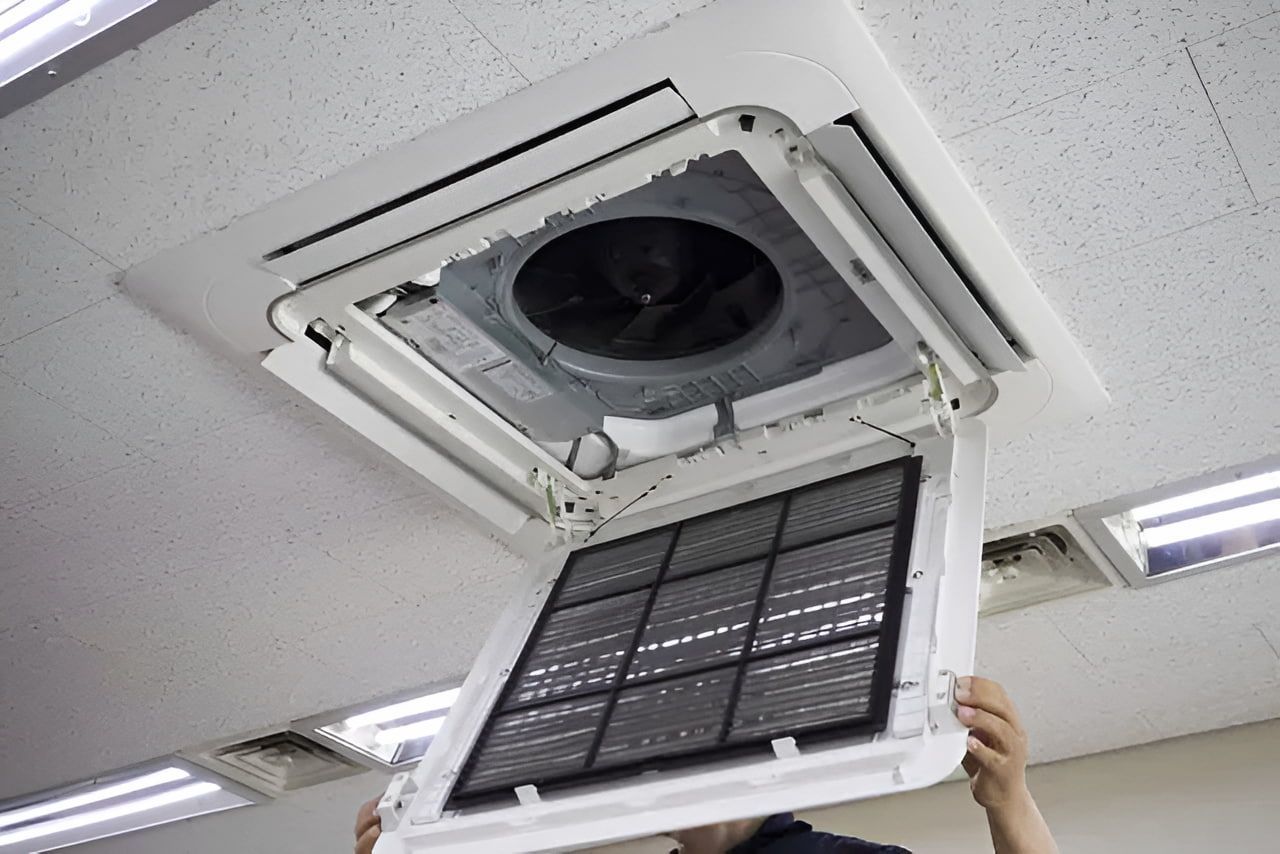 Ceiling Air Conditioner With Open Panel, Revealing Filter and Fan — EcoAir Conditioning in Coconut Grove, NT