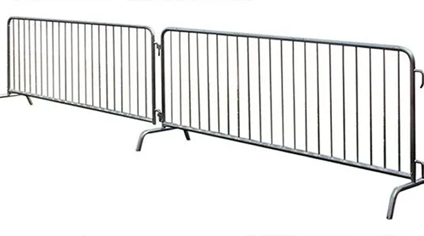 Three linked silver metal crowd-control barricades on a white background