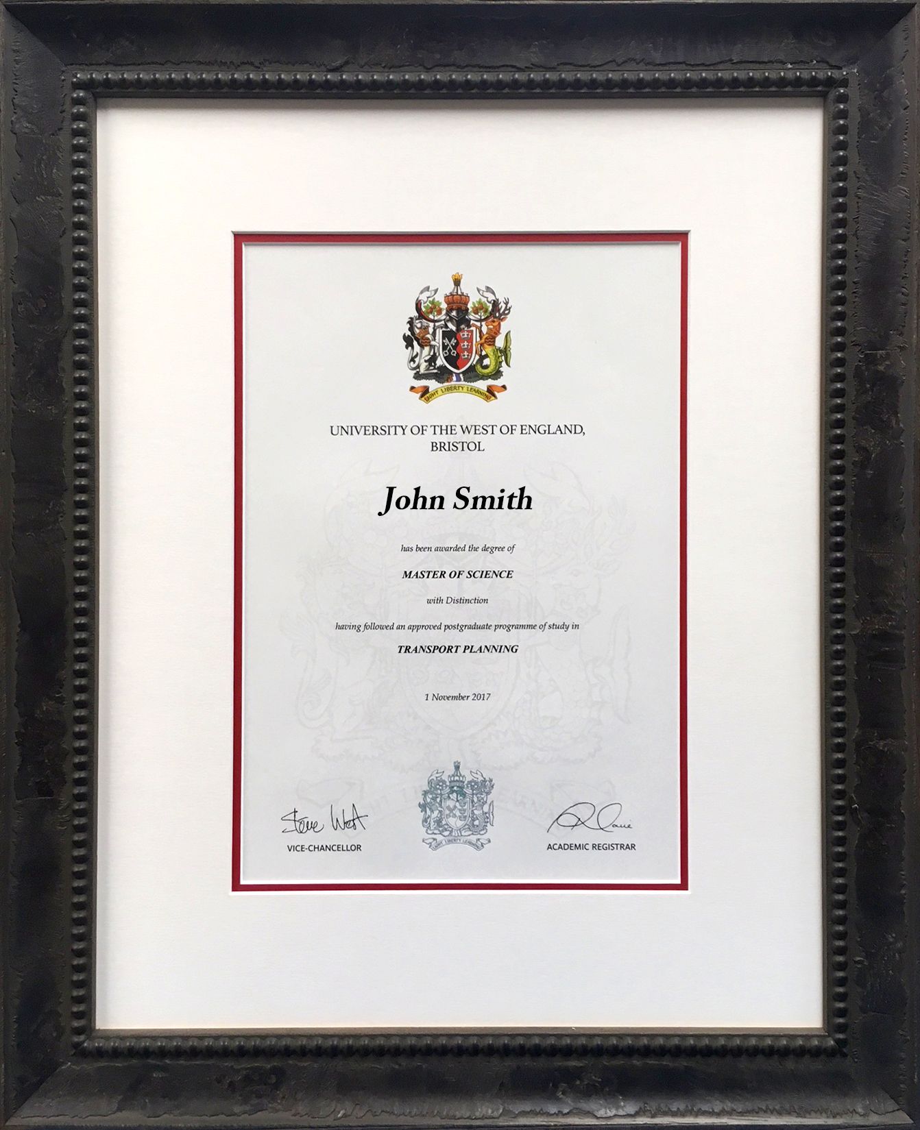 A framed certificate with the name john smith on it