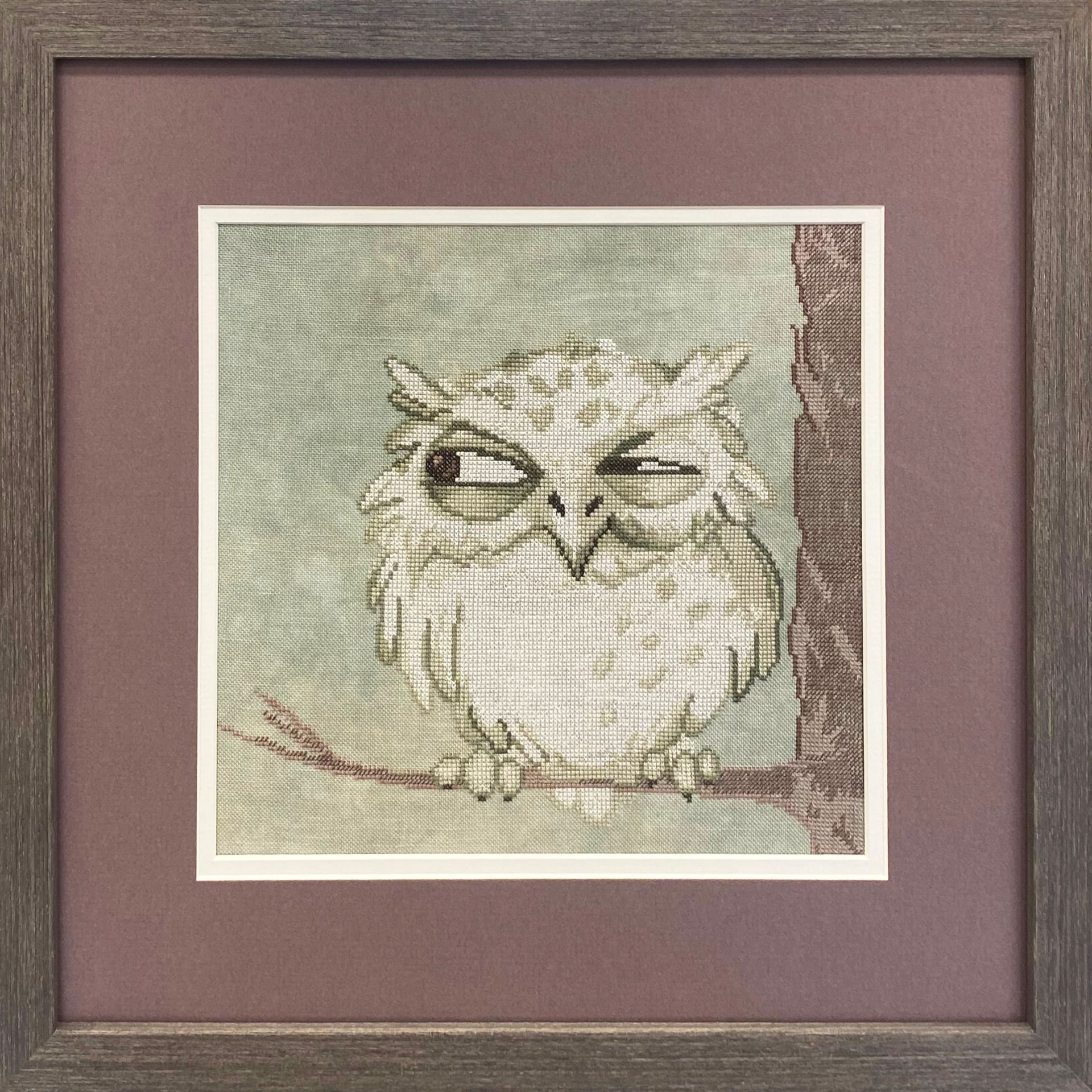 a watercolor painting of a owl