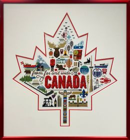 Cross-stitched maple leaf design with “CANADA” in red on a white background